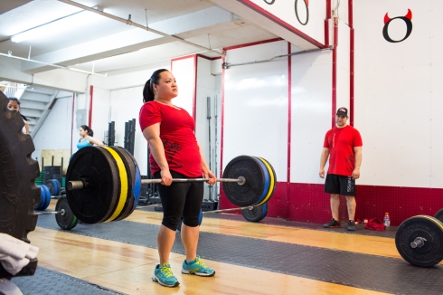 Mary dead lifts 215 lbs at CFHK. Photo Credit: Annabel Clark for The Wall Street Journal.